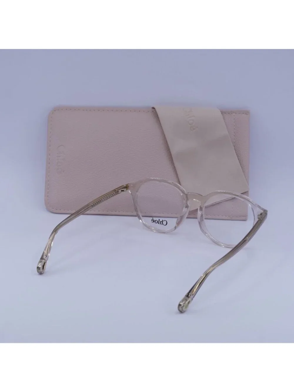 Chloe CH0012OA 001 Round Eyeglasses 50mm - Transparent Pink
